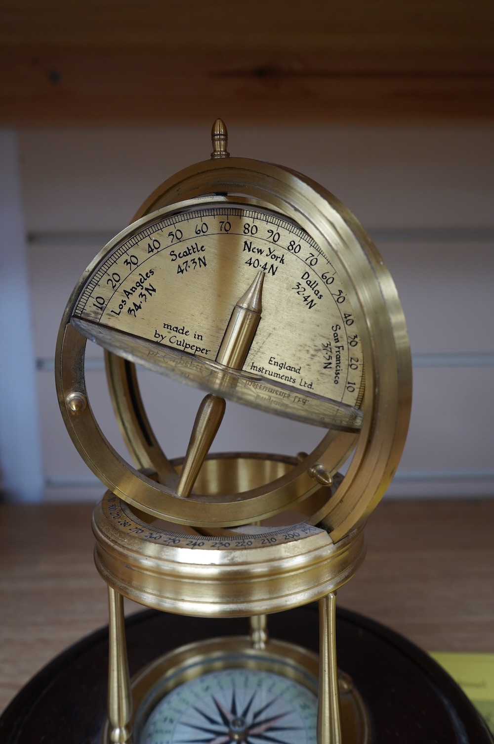 A reproduction brass Astro Visualizer designed by Barrie J Tonkinson and made in England by Culpepper Instruments Ltd., on a hardwood base, 24cm high, with user manual. Condition - fair to good.